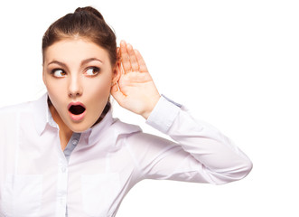 Overhears woman put her hand to her ear