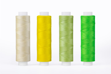 Set of sewing thread coils, miscellaneous colours, isolated on white