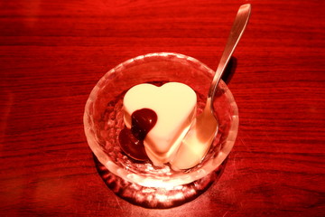 A heart shaped vanilla ice cream