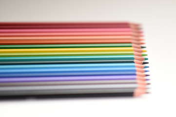 Fototapeta premium colored pencils on a white background