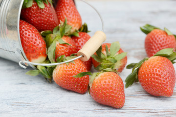 Strawberries lying on wood