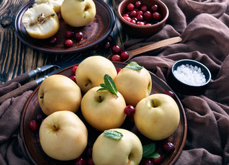 Pickled apples served on an earthenware plates