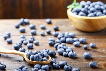blueberries on wooden background