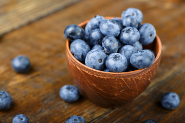 blueberries in a plate on the table