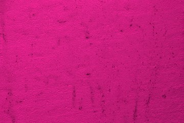 pink solid scratched plaster on the wall texture - nice abstract photo background