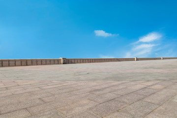 Empty square tiles and beautiful sky scenery