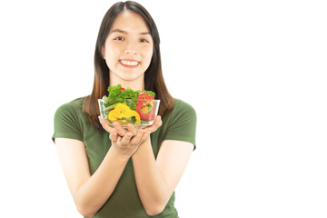 Happy lady holding kichen stuff over copy space background - people home made food preparation concept