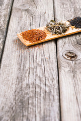 tea crops on bambbo serving tray on old rusty wooden table