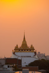 The Golden Mount at Wat Saket at Twilight Time, Travel Landmark of Bangkok, Thailand.