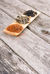 tea crops on bambbo serving tray on old rusty wooden table