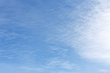 Obraz premium Blue sky with white cirrocumulus clouds. Natural background