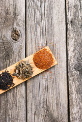 tea crops on bambbo serving tray on old rusty wooden table