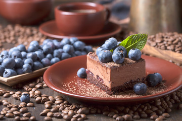 Chocolate cake with blueberries.