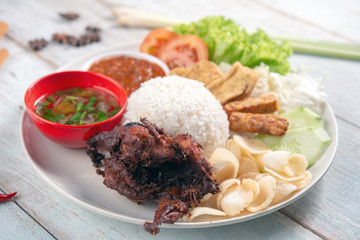 Nasi lemak kukus with quail meat