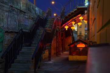Chinese lantern. China town. night Chinese restaurant. urban landscape. stairs and night lights