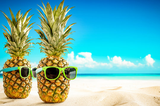 Fresh fruit on beach and summer time 
