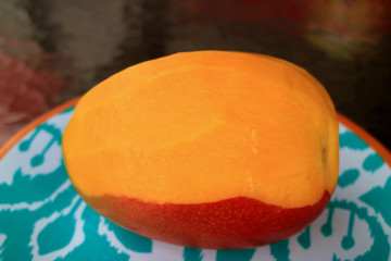 Closeup of a Peeled Fresh Ripe Mango fruit Sold Across South America
