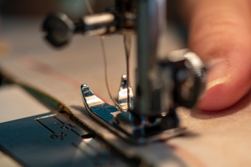 Fototapeta na wymiar Close up view of sewing machine background.