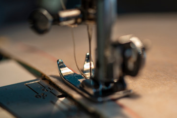 Fototapeta na wymiar Close up view of sewing machine background.