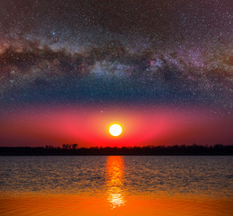 dramatic twilight scene, starry sky above the evening lake