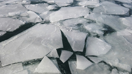 Frozen surface of the ocean cracked. extreme weather
