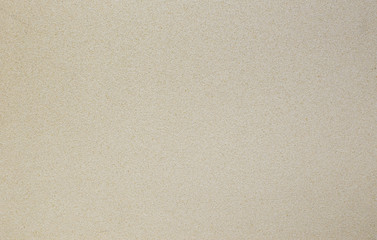 Photo of old gray cement wall with fractures.