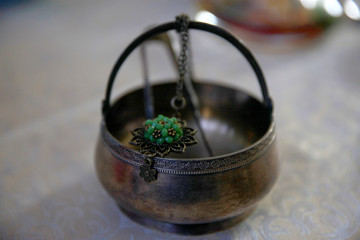 Old sugar bowl and beautiful necklaces