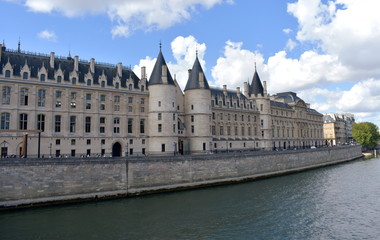 Fototapeta na wymiar View of La Conciergerie with the Seine river. Paris, France.