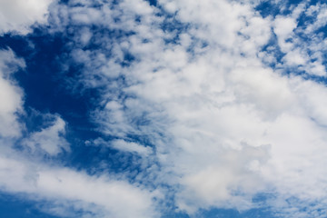 Fototapeta premium Blue sky with clouds on a sunny day.