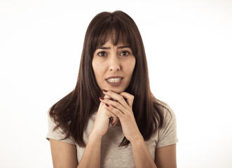 Fototapeta premium Portrait of a young attractive woman looking scared and shocked.Human expressions and emotions