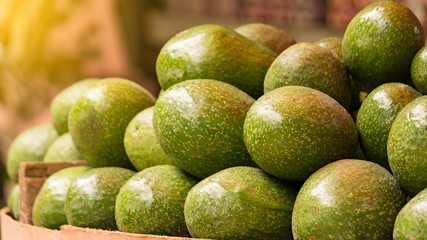 Many avocados are sold on the street.