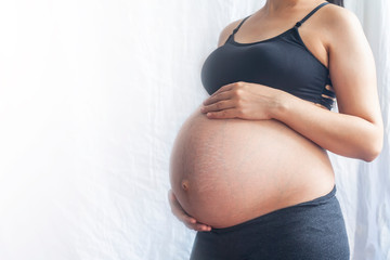 Pregnant woman. 9th Month of Pregnancy. Copy space