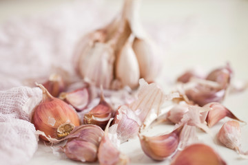 Obraz na płótnie Canvas Bulbs of garlic- on bright background