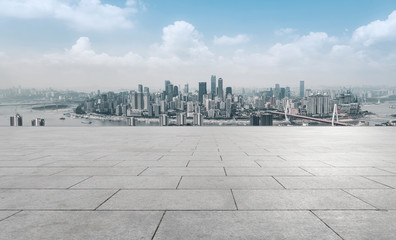 Urban skyscrapers with empty square floor tiles