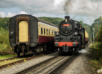 Fototapeta na wymiar Slandard Class 4 locomotive no 76038 on route to Pickering on the North Yorkshire Moors Railway
