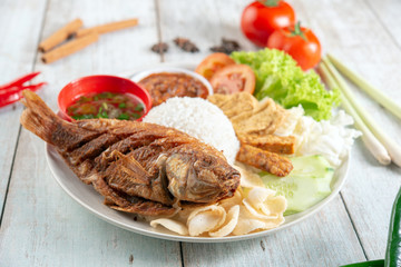 Fried tilapia fish and rice