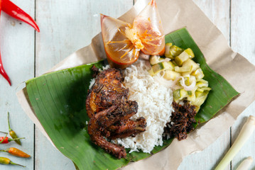 Nasi lemak kukus with quail