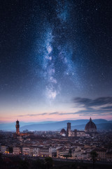 Florence city skyline under milky way
