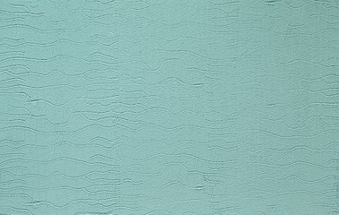 Photo of old blue cement wall with fractures. Texture for pattern.