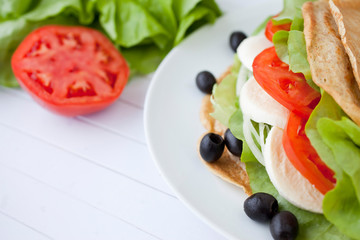 Sandwich with mozzarella and vegetables