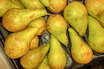 juicy pears for sale in market for background