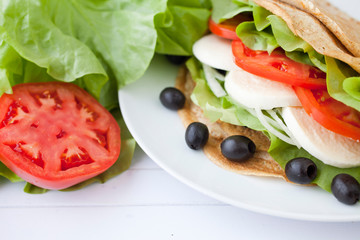 Sandwich with mozzarella and vegetables
