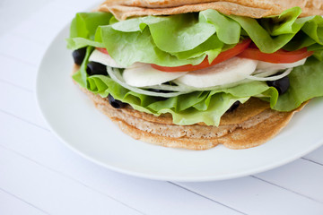 Sandwich with mozzarella and vegetables
