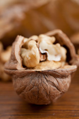Walnuts on wooden background