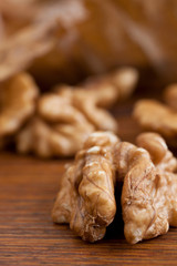 Walnuts on wooden background