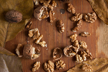 Walnuts on wooden background