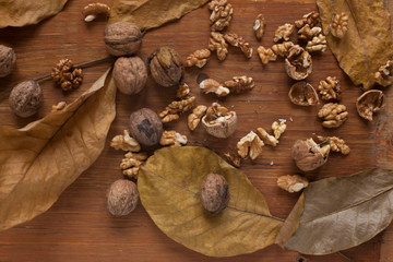 Walnuts on wooden background