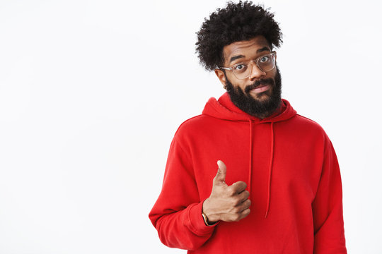 Nice Work, Proud Of You. Portrait Of Supportive Delighted African American Male Project Manager In Glasses With Beard Smiling In Approval Showing Thumbs Up Gesture, Liking Good Artwork Over Gray Wall