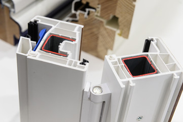 demonstration of opening and closing of plastic and wooden windows on a sample of profiles....