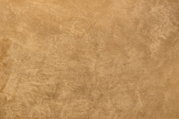 Obraz premium Photo of old gold cement wall with fractures. Texture for pattern.